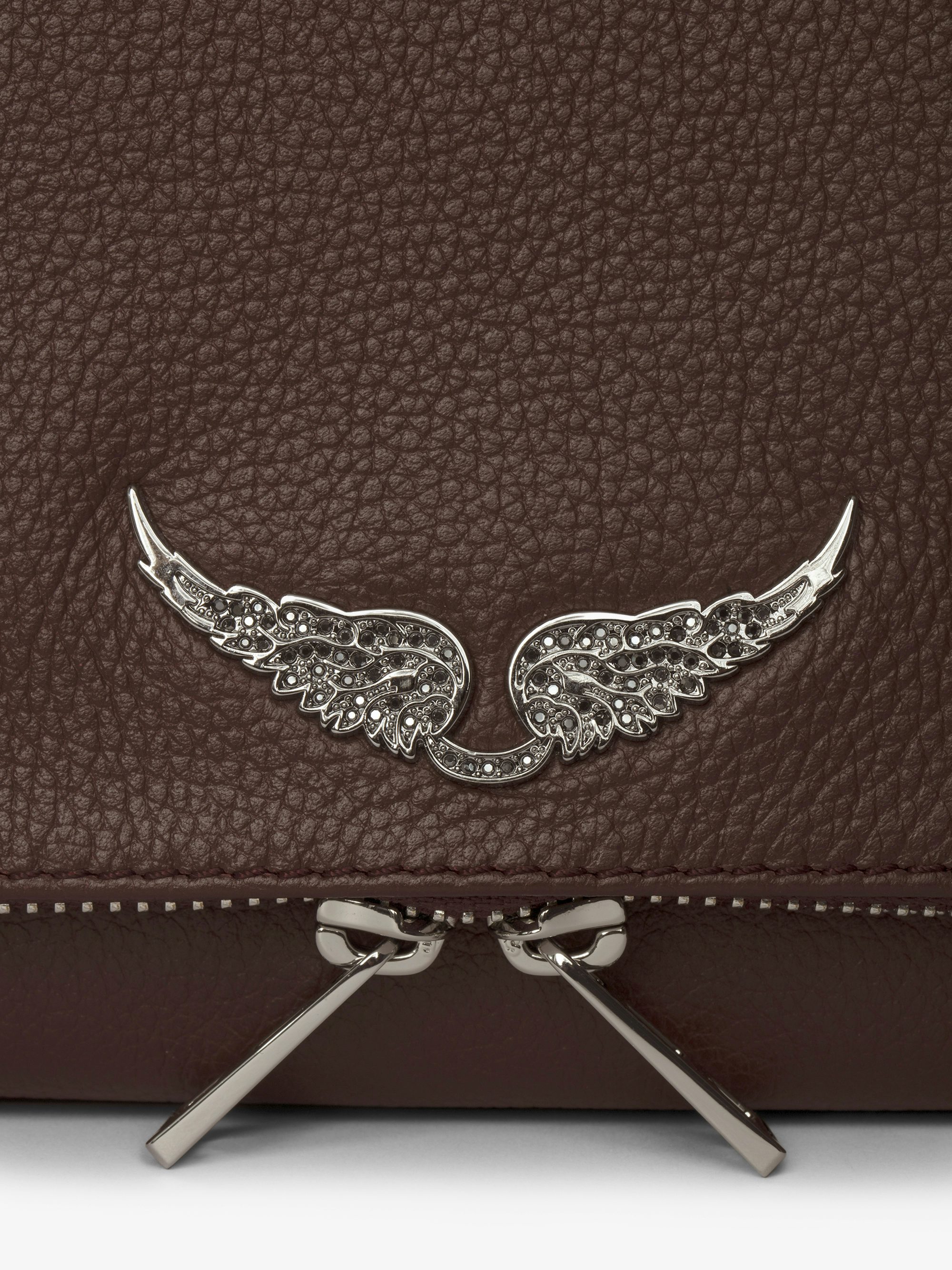 Rock Clutch - Grained leather clutch with double leather and metal chains and rhinestone-embellished wings.